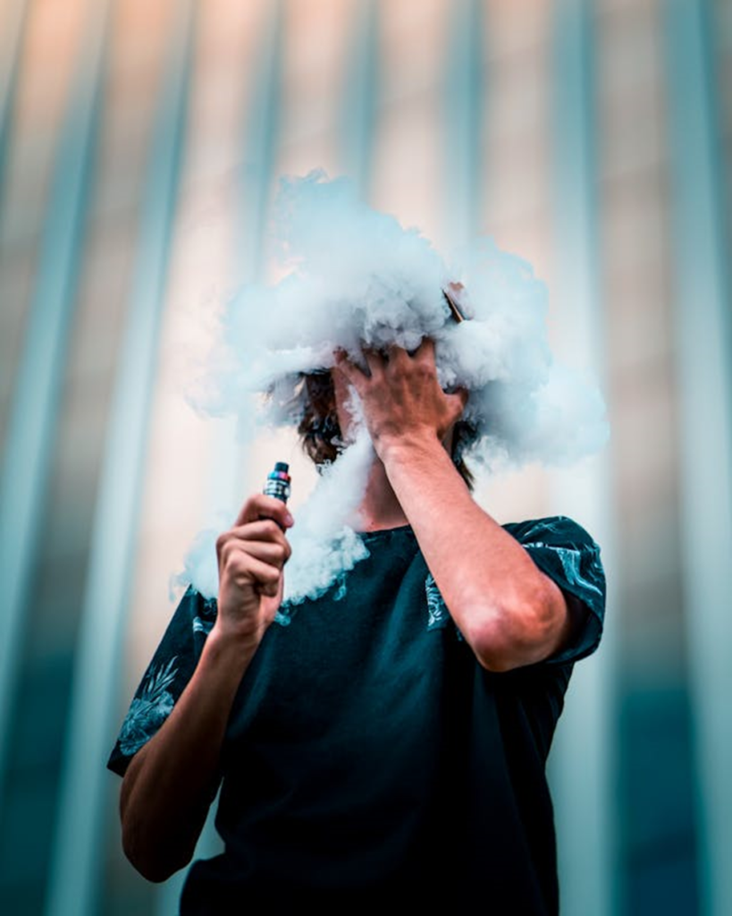 young man vaping weed